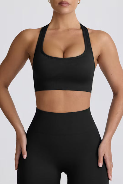 Super Sculpt Seamless T-Back Sports Bra in Black