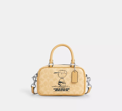 Coach X Peanuts Satchel Crossbody Bag In Signature Canvas With Charlie Brown